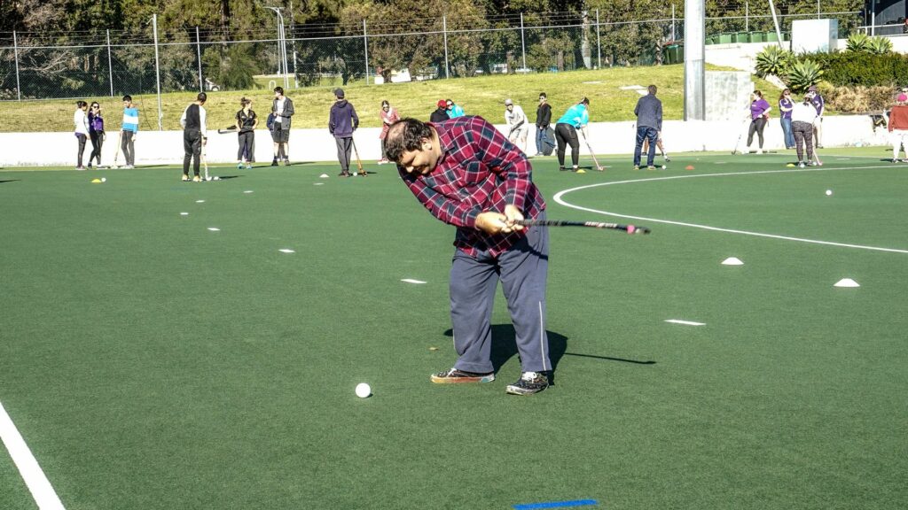 Participant playing golf.